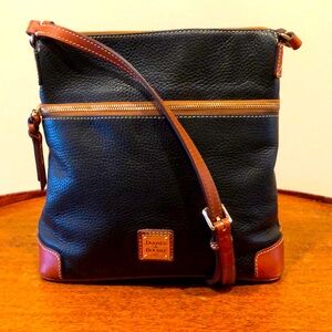 Dooney and Bourke pebbled cross body purse, black and tan